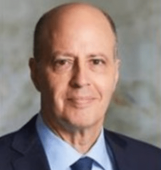 Cliff Rand in a dark suit and tie